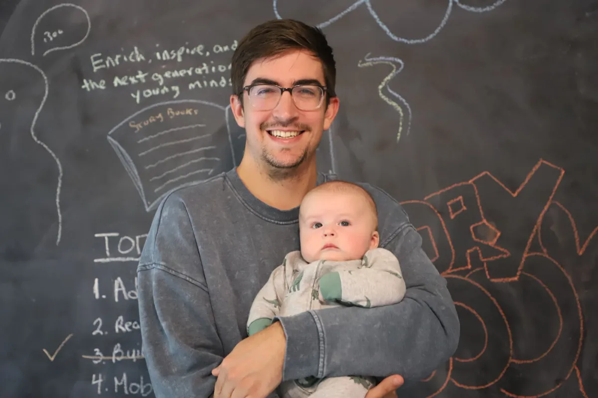 dad holding child